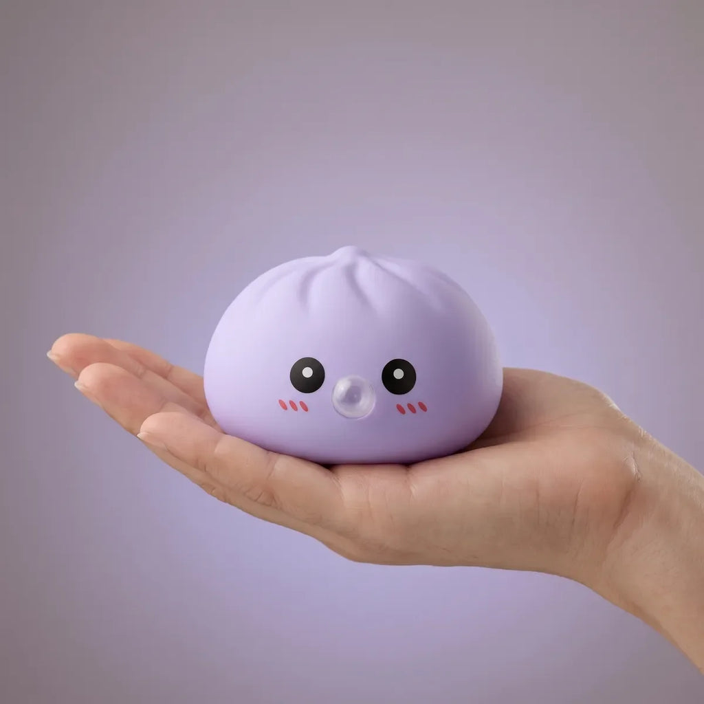 Squishy Dumpling Bubble Bleu — tenu dans la main