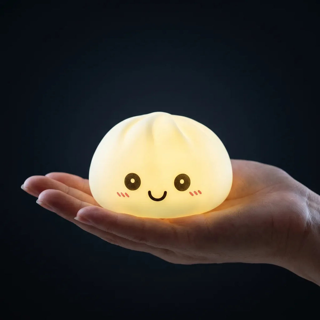 Veilleuse Squishy Dumpling Bleue — tenue dans la main