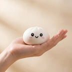 Squishy Dumpling Mystère Boîte Surprise — tenu dans la main