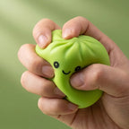 Squishy Dumpling Mystère Boîte Surprise — pressé entre les doigts