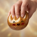 Squishy Dumpling Trésor Doré — pendant la remontée lente de la pâte