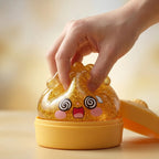 Squishy Dumpling Lingot Doré — pressé entre les doigts