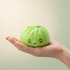 Squishy Dumpling Bubble Vert Jade — tenu dans la main