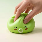 Squishy Dumpling Bubble Vert Jade — pendant la remontée lente de la pâte