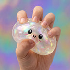 Squishy Dumpling Holographique — pressé entre les doigts