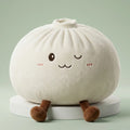 Squishy Dumpling Blanc XXL Coussin — vu de face sur fond neutre