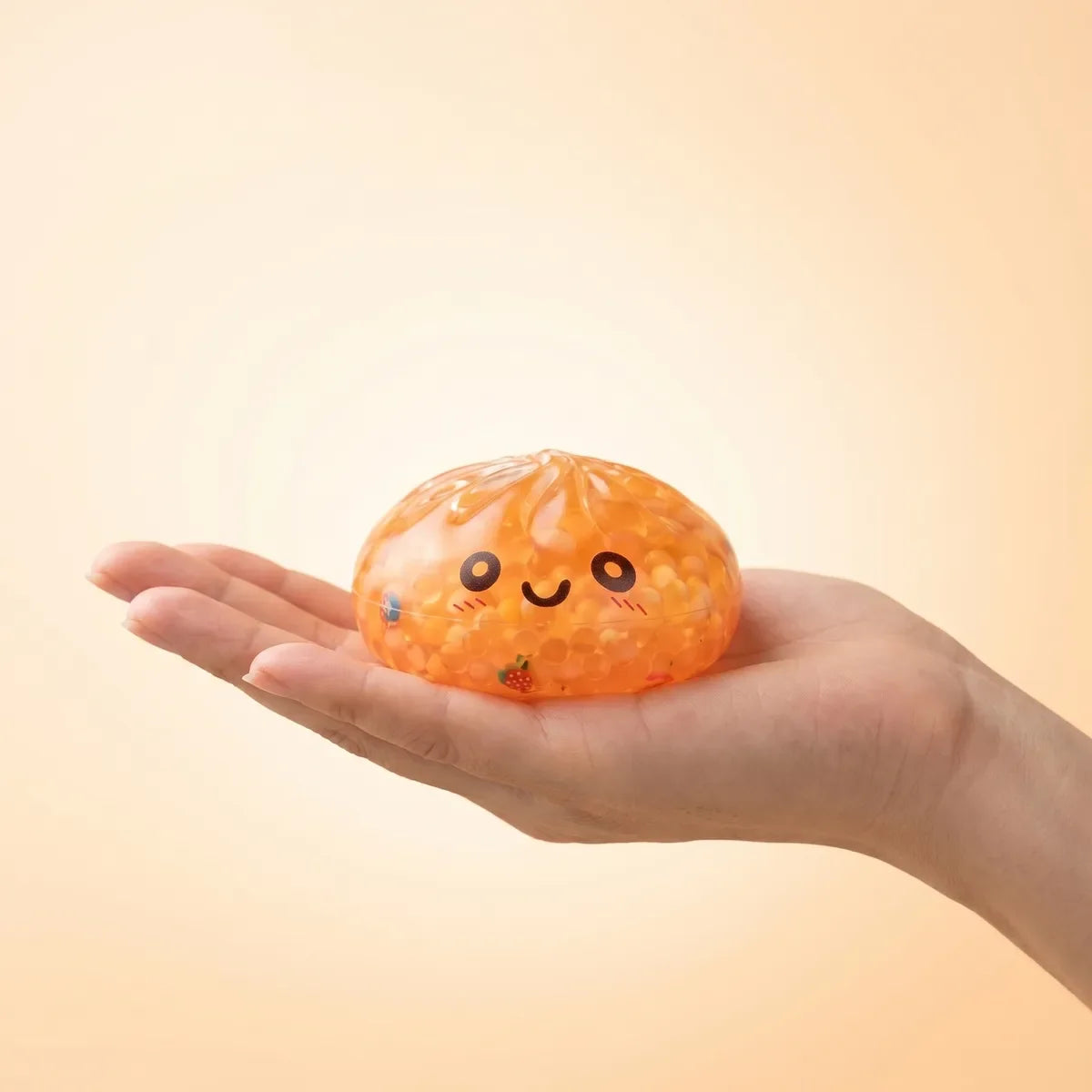 Squishy Dumpling Mystère Bulle Pastel — tenu dans la main