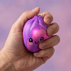 Mini Squishy Dumpling Mystère Tie & Dye — pressé entre les doigts