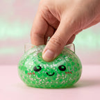 Squishy Dumpling Mystère Licorne Étoilée — pressé entre les doigts