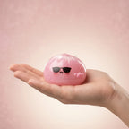 Squishy Dumpling Mystère à Lunettes — tenu dans la main