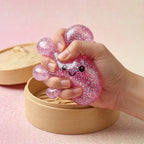 Squishy Dumpling Rose à Paillettes — complètement écrasé