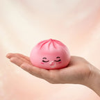 Squishy Dumpling Bubble Rose Marbré — tenu dans la main