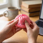 Squishy Dumpling Bubble Rose Marbré — utilisé comme anti-stress