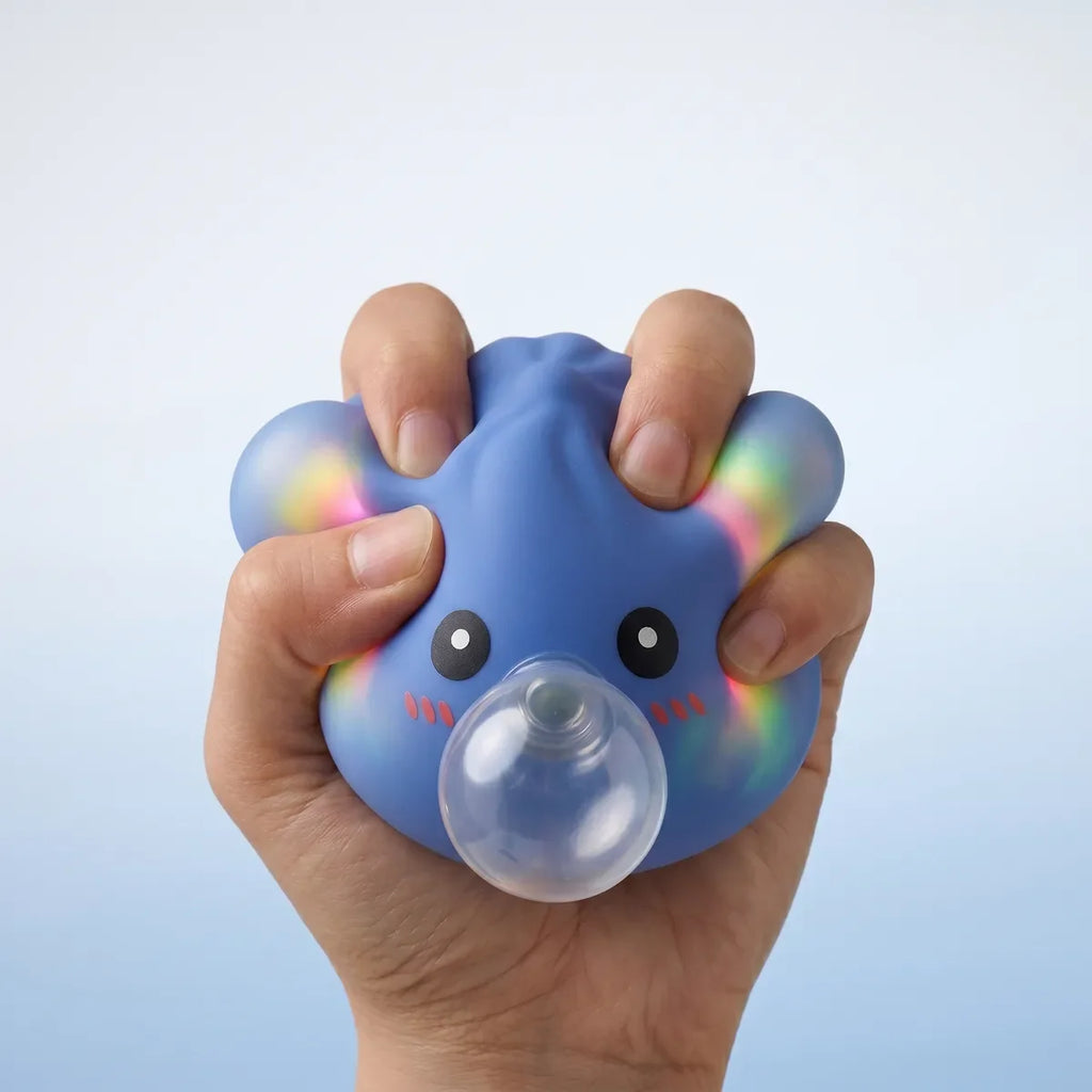 Squishy Dumpling Bubble Violet — pressé entre les doigts