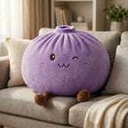 Squishy Dumpling Violet XXL Coussin — posé sur un canapé