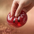 Squishy Dumpling Rouge à Paillettes — en cours de compression