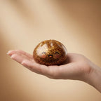 Squishy Dumpling Mystère Brioche — tenu dans la main