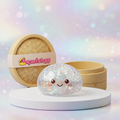 Squishy Dumpling Argenté à Paillettes — photographié en studio