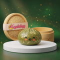 Squishy Dumpling Vert Émeraude Pailleté — vu de face sur fond neutre