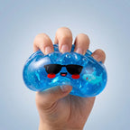 Squishy Dumpling à Lunettes Noires — pressé entre les doigts