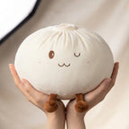 Squishy Dumpling Blanc XXL Coussin — tenu à deux mains